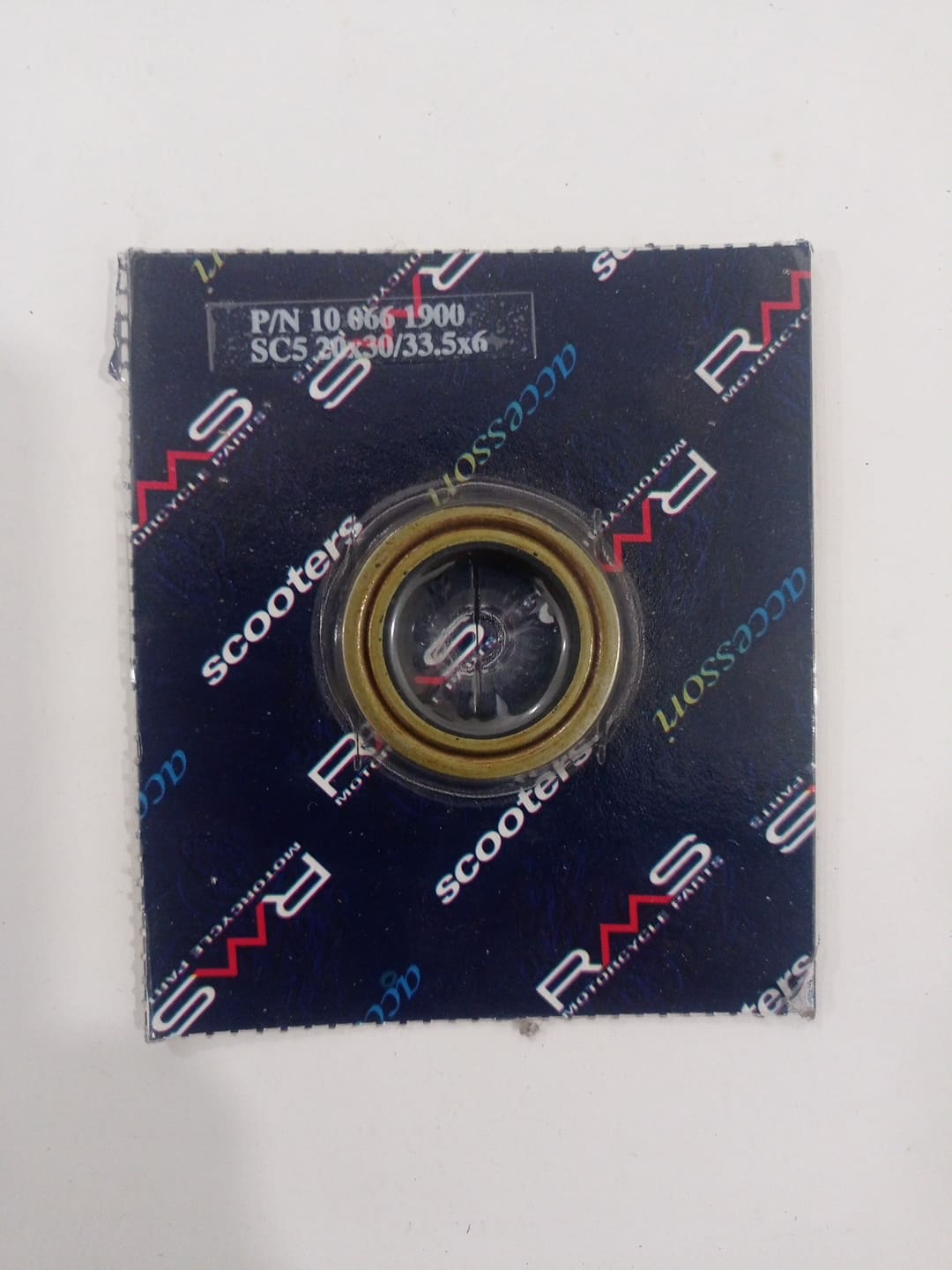 Paraolio RMS per albero motore lato volano scooter con motore Minarelli verticale ed orizzontale aria e liquido misure 20-30x33.5-5.3x6, ricambio 100661900